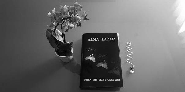 A copy of the book When the Light Goes Out by Alma Lazar
